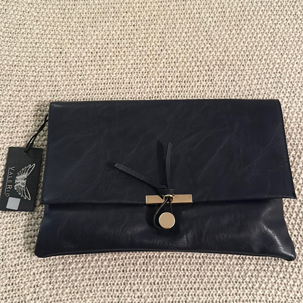 Brand new Valerio black clutch
